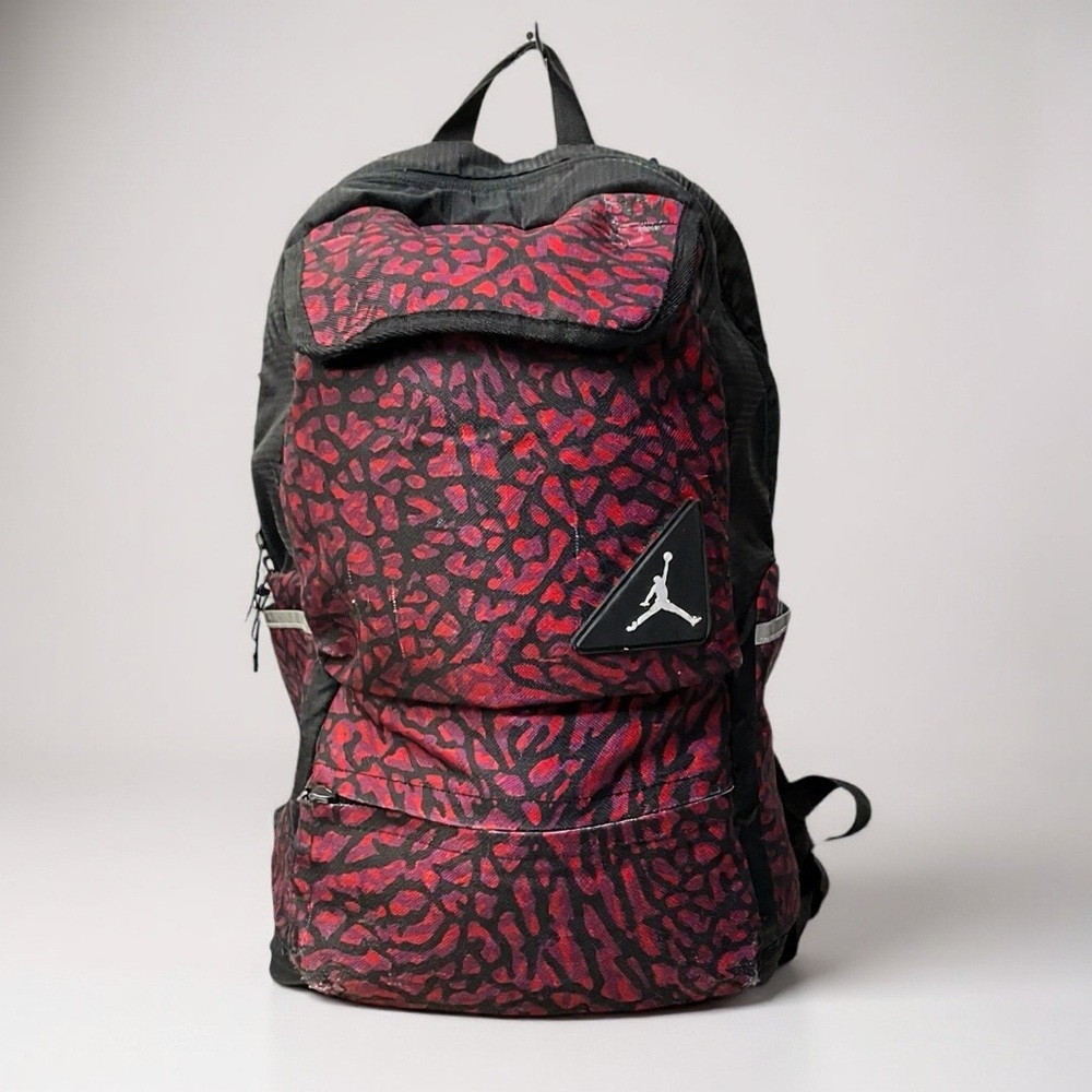 🔥 Jordan Red & Black Animal Print Backpack
💼 Classic Jumpman Logo | Retro